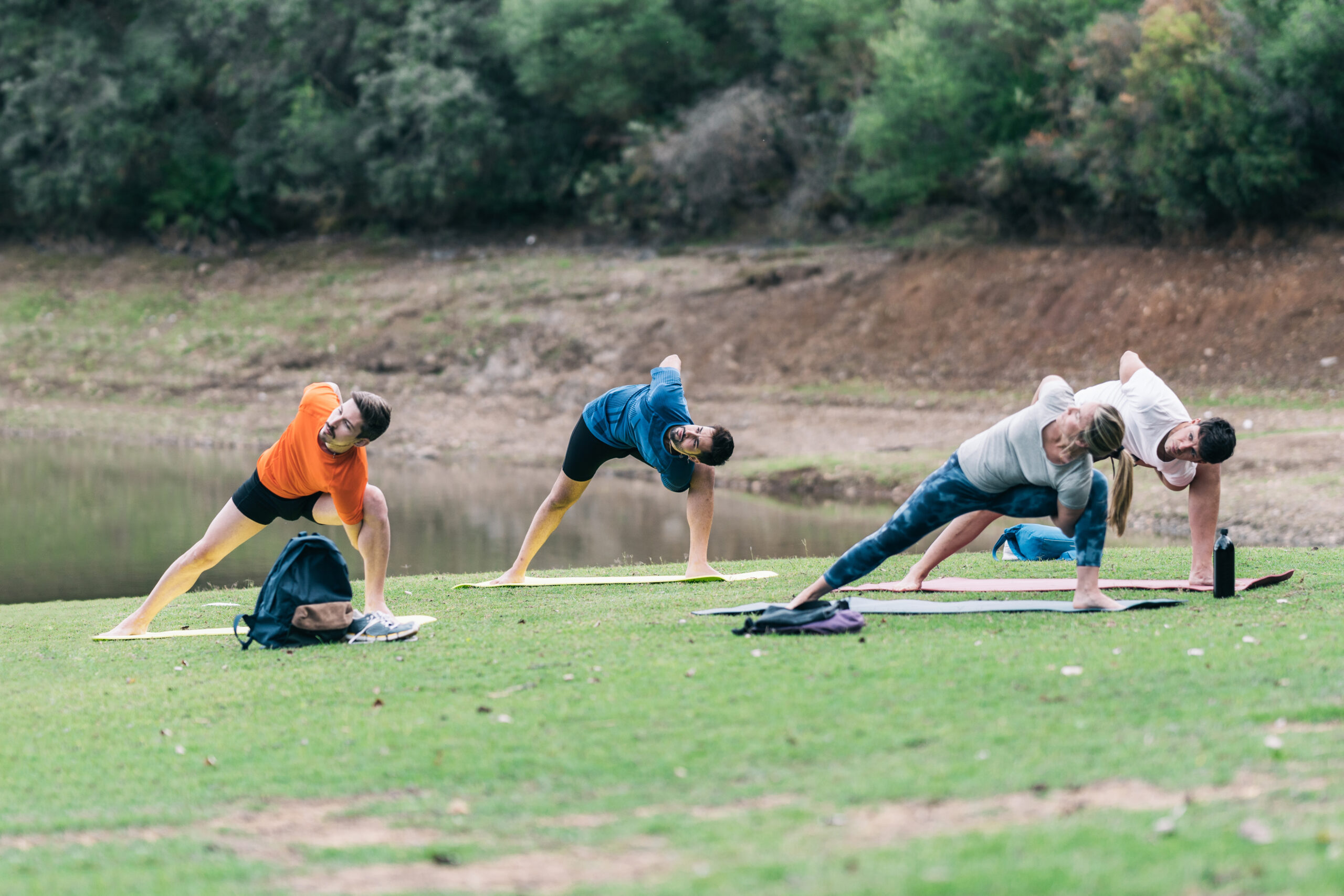 Yoga instructor leading a yoga class in a park